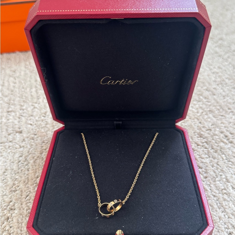 Cartier Gold Interlocking Love Necklace - Yellow Gold